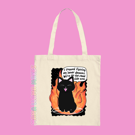 I stopped fighting my inner demons. Were on the same side now tote bag